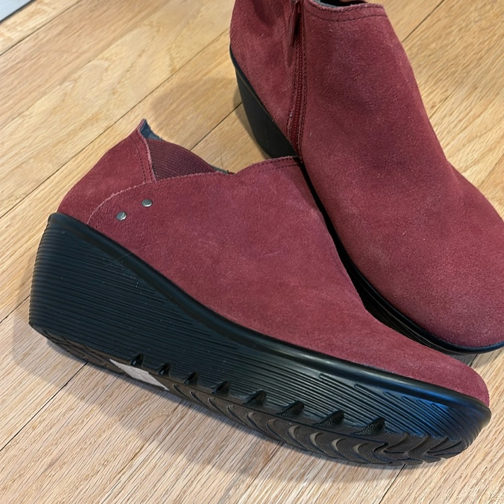 Skechers booties. Worn once. Size 8.